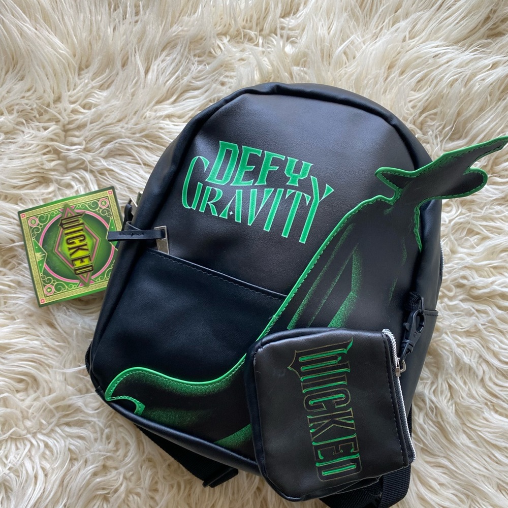 Universal Black and Green Backpack with Sporty Design